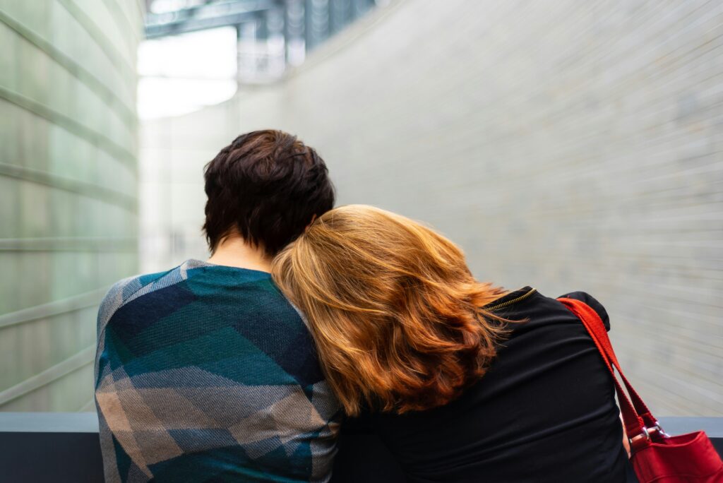 Two people on a bench, symbolising an empathetic encounter
